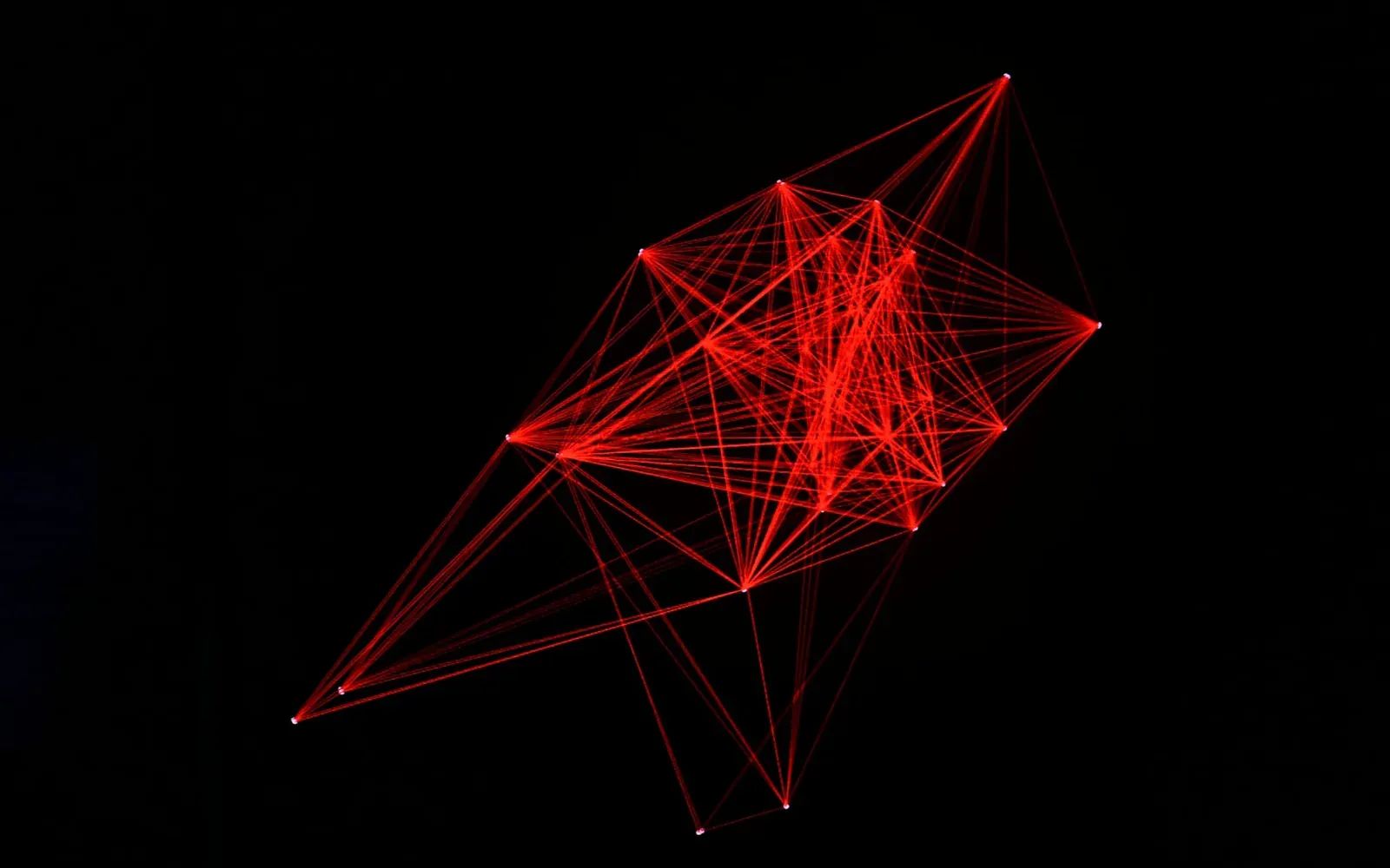 Red wireframe mesh of a compromised node cluster against black